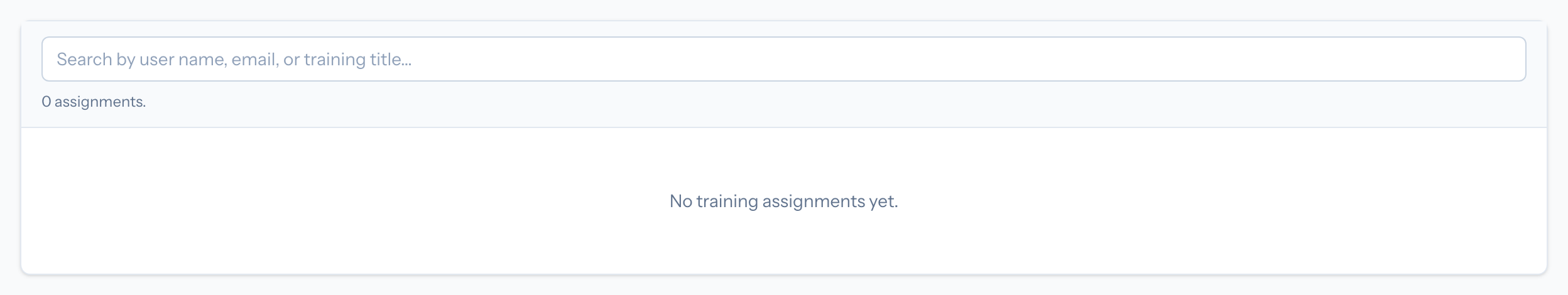 The user training assignments table grouped by person with status, video, and test columns.